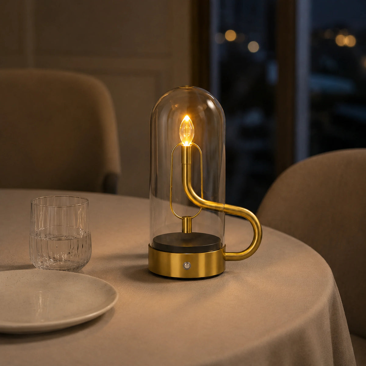 Ember Dome J006 lamp with a warm flame-style LED inside a clear glass cylinder.