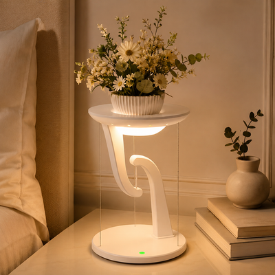 Side view of the rounded Float Charge table lamp.