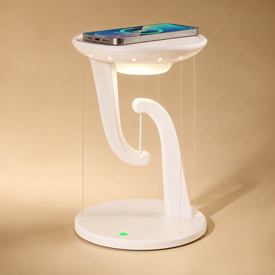 Wireless charging phone placed on the base of the floating lamp.