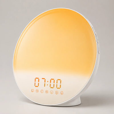 Daybreak Disc shown at low brightness in a dark bedroom.