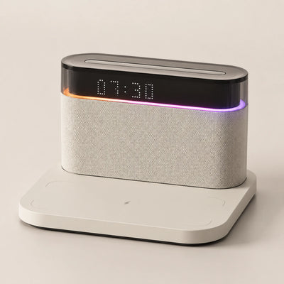 Compact display speaker positioned on a desktop setup.