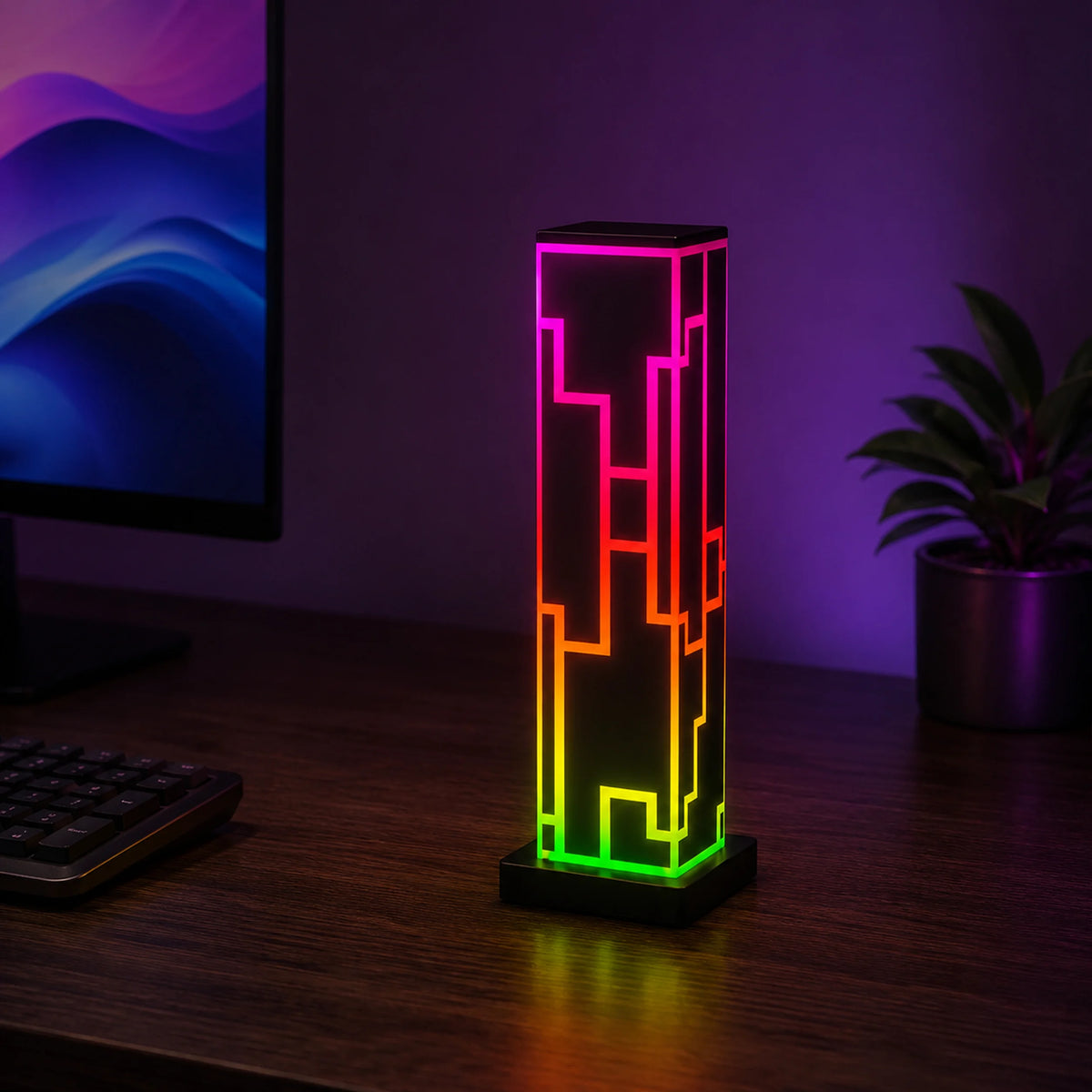 Prism Cube RGB acrylic lamp glowing in multiple colors.